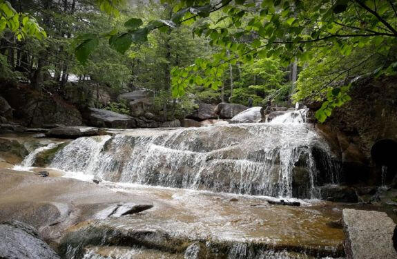 The series of small waterfalls (total drop of about 75 feet) was once the location of an old sawmill operation in the 1800s. This is an easy 1.2 mile (round trip) hike on a wide dirt trail that meanders through a forest and ends at the base of the falls.